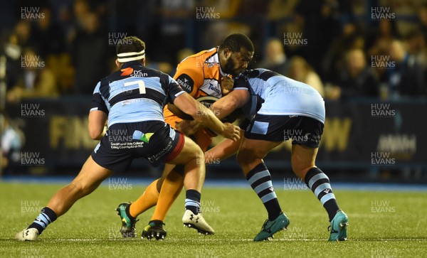280918 - Cardiff Blues v Cheetahs - Guinness PRO14 - Ox Nche of Cheetahs is tackled by Ellis Jenkins and Rhys Gill of Cardiff Blues