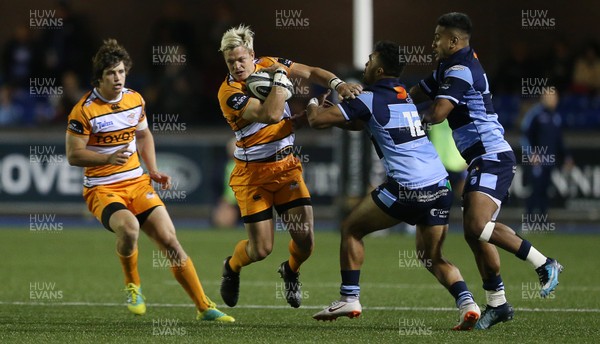 280918 - Cardiff Blues v Toyota Cheetahs - Guinness PRO14 - Tian Schoeman of Cheetahs is tackled by Willis Halaholo of Cardiff Blues