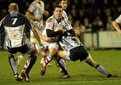 170212 Cardiff Blues v Ulster - RaboDirect PRO 12 -Ulster's Paddy Wallace is tackled by Blues' Dan Parks