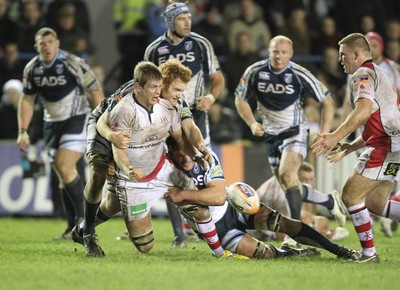 170212 Cardiff Blues v UlsterUlster's Chris Henry is brought down by Xavier Rush and Paul Tito