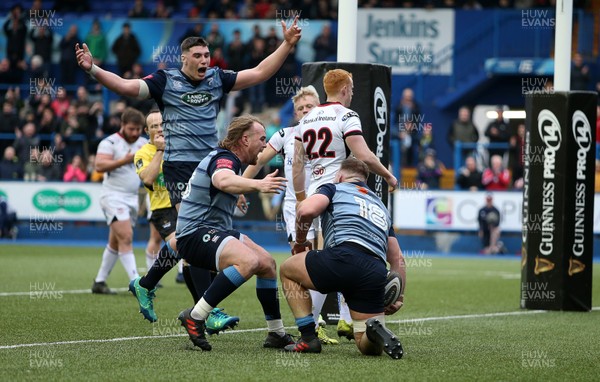 240318 - Cardiff Blues v Ulster  - Guinness PRO14 - Dillon Lewis of Cardiff Blues celebrates with Seb Davies and Kristian Dacey after scoring a try