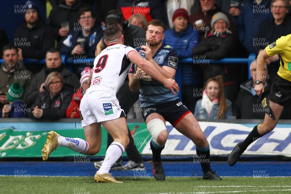 240318 - Cardiff Blues v Ulster - Guinness PRO14 - Owen Lane of Cardiff Blues is tackled by John Conney of Ulster