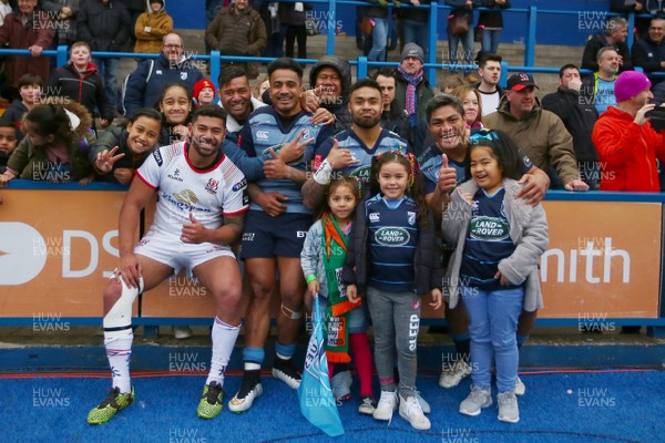 240318 - Cardiff Blues v Ulster - Guinness PRO14 - Nick Williams(R), Willis Halaholo and Rey Lee Lo of Cardiff Blues join with Charles Pitutau of Ulster, family and friends at the end of the game