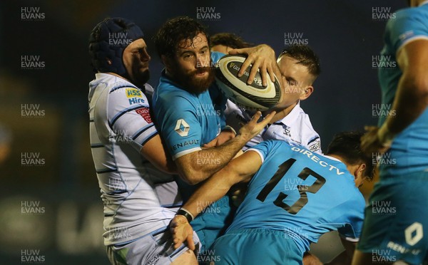 061118 - Cardiff Blues v Uruguay - SYFT International Challenge - Rodrigo Silva of Uruguay is tackled by Alun Lawrence and Cam Lewis of Cardiff Blues