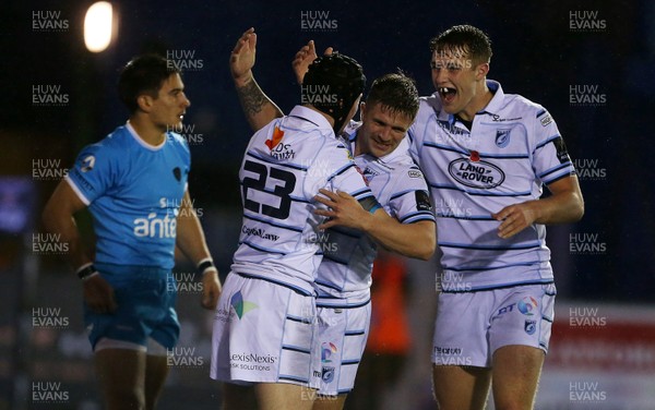 061118 - Cardiff Blues v Uruguay - SYFT International Challenge - Ioan Davies of Cardiff Blues celebrates scoring a try with Lewis Jones and Max Llewellyn of Cardiff Blues