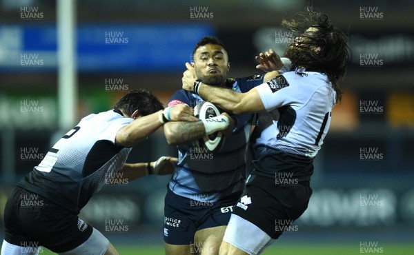 041117 - Cardiff Blues v Zebre - Guinness PRO14 - Willis Halaholo of Cardiff Blues is tackled by Oliviero Fabiani and Andrea De Marchi of Zebre