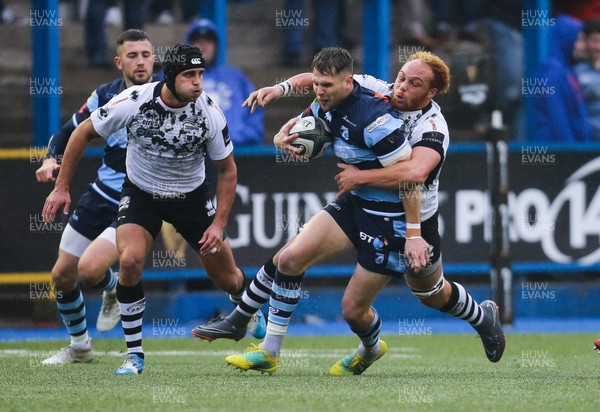041118 - Cardiff Blues v Zebre, Guinness PRO14 - Tom Williams of Cardiff Blues is tackled by Antoine Koffi of Zebre