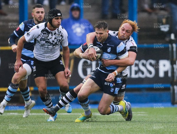 041118 - Cardiff Blues v Zebre, Guinness PRO14 - Tom Williams of Cardiff Blues is tackled by Antoine Koffi of Zebre