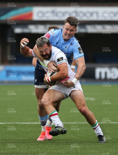 050621 - Cardiff Blues v Zebre, Guinness PRO14 Rainbow Cup - Guglielmo Palazzani of Zebre is held by Jason Harries of Cardiff Blues