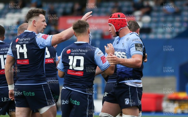 050621 - Cardiff Blues v Zebre, Guinness PRO14 Rainbow Cup - James Botham of Cardiff Blues is congratulated by Jason Harries of Cardiff Blues and Jarrod Evans of Cardiff Blues after scoring try
