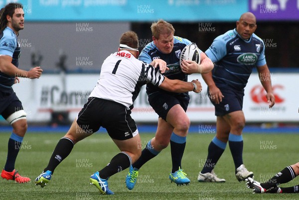 280417 - Cardiff Blues v Zebre - GuinnessPro12 -  Rhys Gill of Blues is tackled by Andrea Lovotti of Zebre