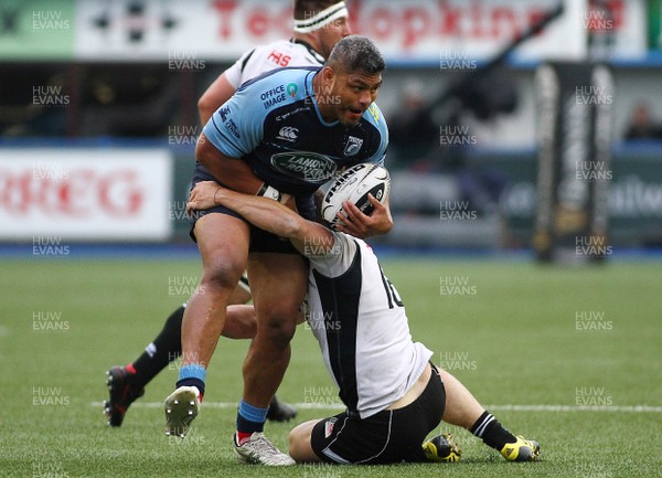 280417 - Cardiff Blues v Zebre - GuinnessPro12 -  Nick Williams of Blues is tackled by Tommaso Castello of Zebre