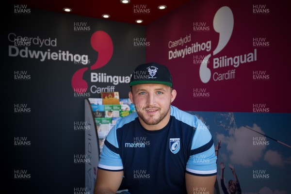 050818 - Cardiff Blues player Dillon Lewis at the Cardiff Council Stand at the National Eisteddfod in Cardiff Bay to help announce an increased commitment by Cardiff Blues to the Welsh language as part of CardiffsBilingual Day