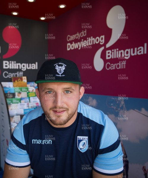 050818 - Cardiff Blues player Dillon Lewis at the Cardiff Council Stand at the National Eisteddfod in Cardiff Bay to help announce an increased commitment by Cardiff Blues to the Welsh language as part of CardiffsBilingual Day