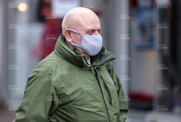 170320 - COVID-19 / Coronavirus - Picture shows a man on Queens Street, Cardiff wearing a face mask