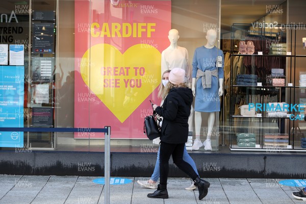 120421 - Picture shows shoppers outside Primark in Cardiff City Centre, Wales this morning on the first day non essential shops are allowed to be open since December 2020 during the coronavirus pandemic