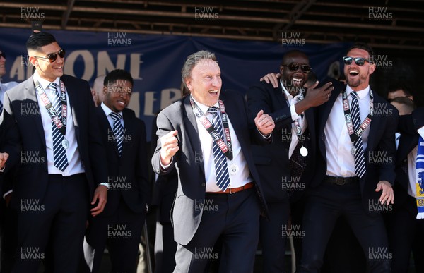 130518 - Cardiff City Open top bus tour to celebrate being promoted into the Premier League - Neil Warnock celebrates with the fans