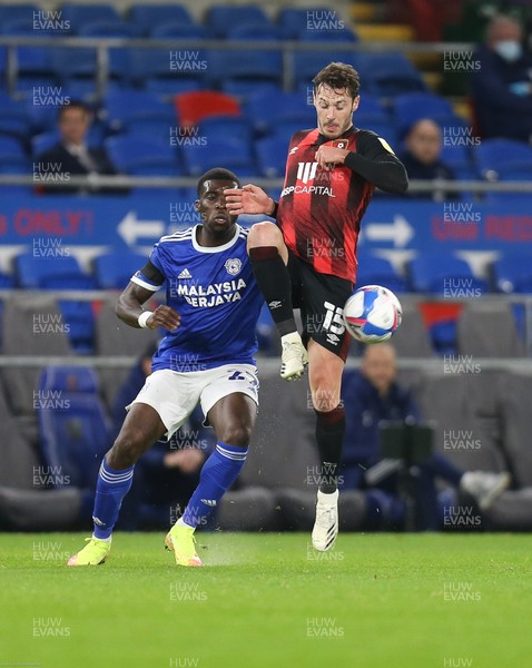 211020 - Cardiff City v AFC Bournemouth, Sky Bet Championship - Adam Smith of Bournemouth wins the ball as Sheyi Ojo of Cardiff City looks on
