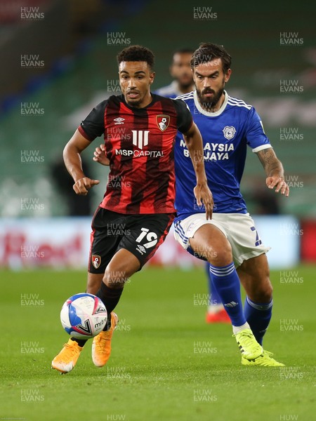 211020 - Cardiff City v AFC Bournemouth, Sky Bet Championship - Junior Stanislas of Bournemouth holds off Marlon Pack of Cardiff City