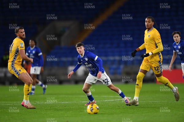 021225 -  Cardiff City v AFC Wimbledon - Vertu Trophy - Troy Perrett of Cardiff City is challenged by Alistair Smith of Wimbledon