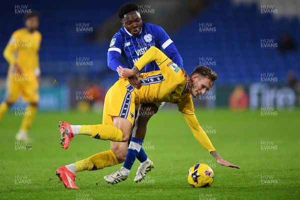 021225 -  Cardiff City v AFC Wimbledon - Vertu Trophy - Dakarai Mafico of Cardiff City is challenged by Callum Maycock of Wimbledon