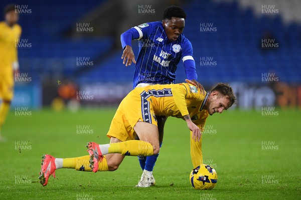 021225 -  Cardiff City v AFC Wimbledon - Vertu Trophy - Dakarai Mafico of Cardiff City is challenged by Callum Maycock of Wimbledon