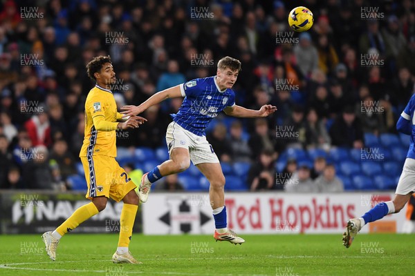 021225 -  Cardiff City v AFC Wimbledon - Vertu Trophy - Dylan Lawlor of Cardiff City is challenged by Aron Sasu of Wimbledon