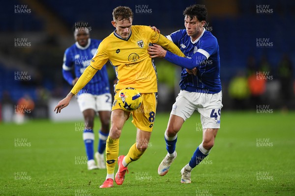 021225 -  Cardiff City v AFC Wimbledon - Vertu Trophy - Luey Giles of Cardiff City is challenged by Callum Maycock of Wimbledon