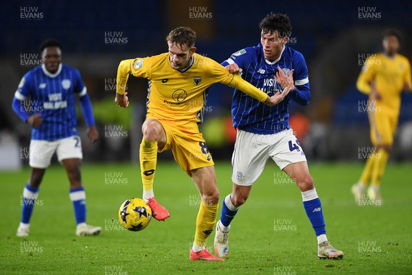 021225 -  Cardiff City v AFC Wimbledon - Vertu Trophy - Luey Giles of Cardiff City is challenged by Callum Maycock of Wimbledon