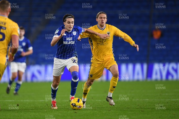 021225 -  Cardiff City v AFC Wimbledon - Vertu Trophy - Joel Colwill of Cardiff City is challenged by Danilo Orsi-Dadomo of Wimbledon