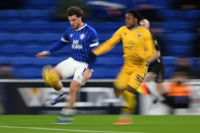 170226 - Cardiff City v AFC Wimbledon - Sky Bet League 1 - Ollie Tanner of Cardiff City is challenged by Junior Nkeng of Wimbledon