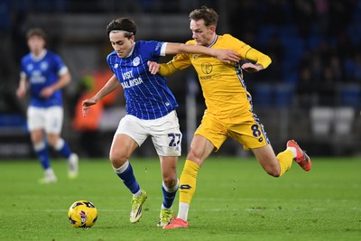 170226 - Cardiff City v AFC Wimbledon - Sky Bet League 1 - Joel Colwill of Cardiff City is challenged by Callum Maycock of Wimbledon
