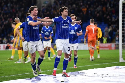 170226 - Cardiff City v AFC Wimbledon - Sky Bet League 1 - Perry NG of Cardiff City celebrates scoring a goal with team mates