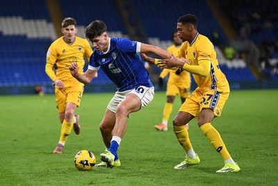 170226 - Cardiff City v AFC Wimbledon - Sky Bet League 1 - Rubin Colwill of Cardiff City is challenged by Zack Nelson of Wimbledon