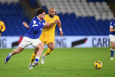170226 - Cardiff City v AFC Wimbledon - Sky Bet League 1 - Ollie Tanner of Cardiff City is challenged by Ryan Johnson of Wimbledon