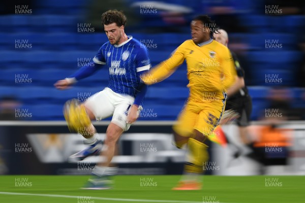 170226 - Cardiff City v AFC Wimbledon - Sky Bet League 1 - Ollie Tanner of Cardiff City is challenged by Junior Nkeng of Wimbledon
