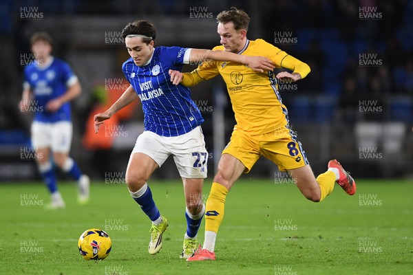 170226 - Cardiff City v AFC Wimbledon - Sky Bet League 1 - Joel Colwill of Cardiff City is challenged by Callum Maycock of Wimbledon