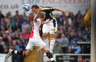 01.08.08 -  Cardiff City v AFC Ajax, Pre-season friendly. Cardiff City's Gavin Rae heads the ball past Ajax's Rasmus Lindgren  