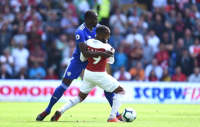 020918 - Cardiff City v Arsenal - Premier League - Alexandre Lacazette of Arsenal is tackled by Souleymane Bamba of Cardiff City