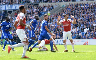 020918 - Cardiff City v Arsenal - Premier League - Shkodran Mustafi (ground) of Arsenal scores goal