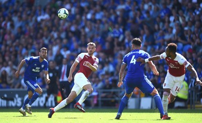 020918 - Cardiff City v Arsenal - Premier League - Aaron Ramsey of Arsenal gets the ball away