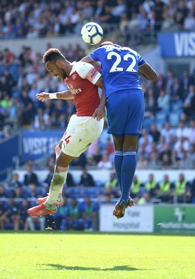 020918 - Cardiff City v Arsenal - Premier League - Pierre-Emerick Aubameyang of Arsenal and Souleymane Bamba of Cardiff City compete in the air