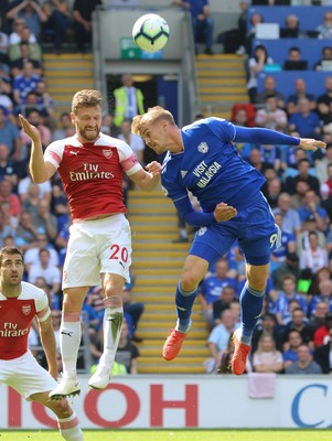 020918 - Cardiff City v Arsenal, Premier League - Danny Ward of Cardiff City and Shkodran Mustafi of Arsenal compete for the ball in the air