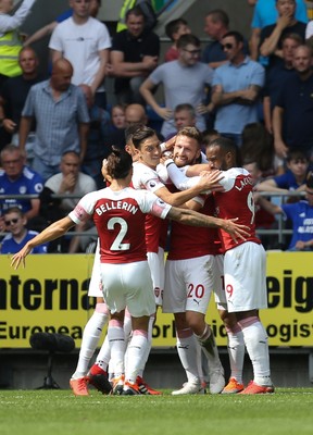 020918 - Cardiff City v Arsenal, Premier League - Arsenal players celebrate after Shkodran Mustafi of Arsenal, centre, scores the opening goal