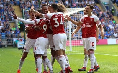 020918 - Cardiff City v Arsenal, Premier League - Arsenal players celebrate after scoring the second goal