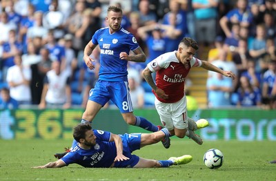 020918 - Cardiff City v Arsenal, Premier League - Lucas Torreira of Arsenal is brought down by Harry Arter of Cardiff City