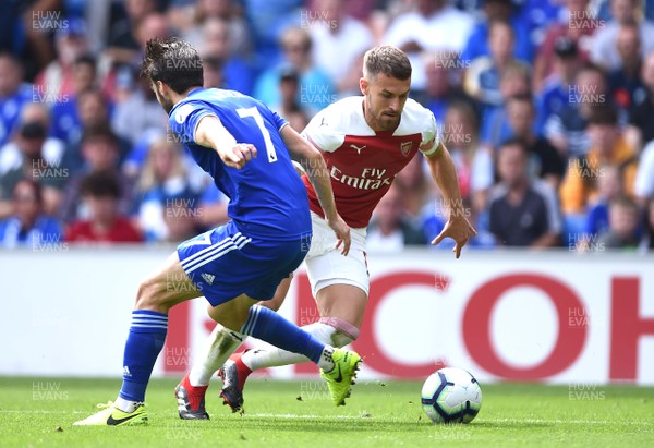 020918 - Cardiff City v Arsenal - Premier League - Aaron Ramsey of Arsenal tries to get past Harry Arter of Cardiff City