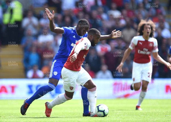 020918 - Cardiff City v Arsenal - Premier League - Alexandre Lacazette of Arsenal is tackled by Souleymane Bamba of Cardiff City