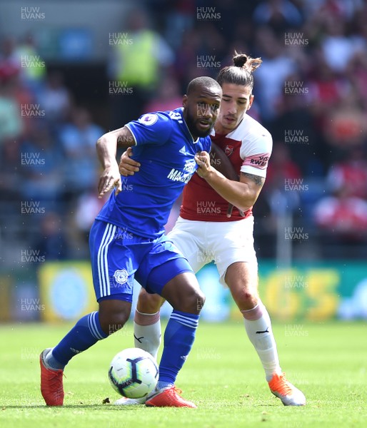 020918 - Cardiff City v Arsenal - Premier League - Junior Hoilett of Cardiff City is tackled by Hector Bellerin of Arsenal