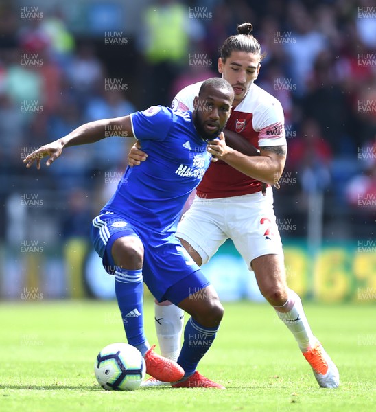 020918 - Cardiff City v Arsenal - Premier League - Junior Hoilett of Cardiff City is tackled by Hector Bellerin of Arsenal